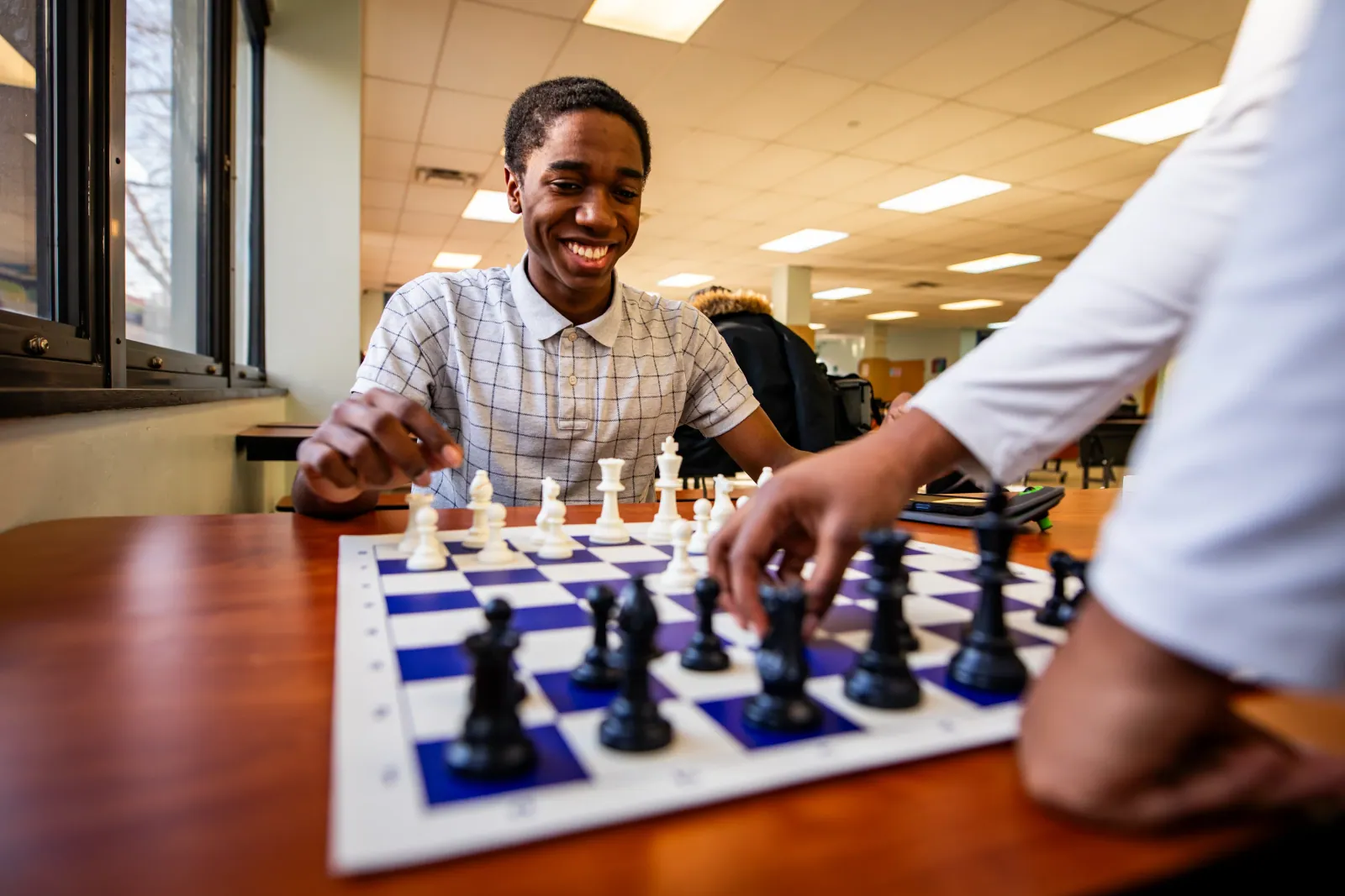 Freire Wilmington student playing chess