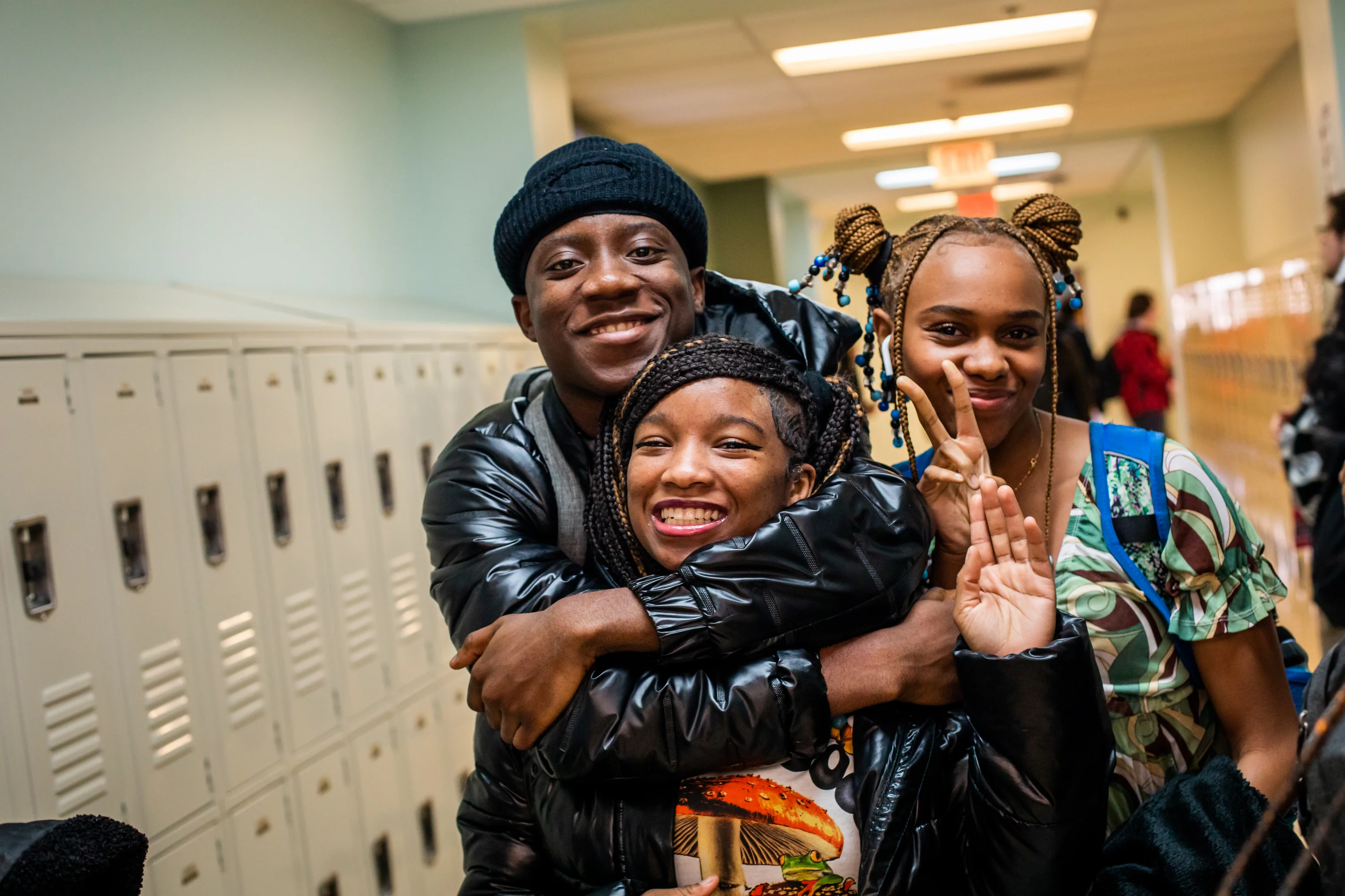 Freire Charter School Wilmington students hugging in the hallway